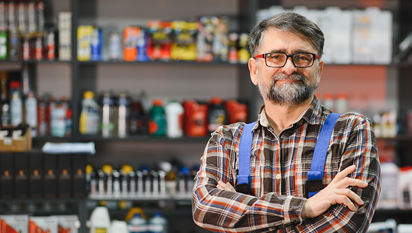 Man in front of stock shelves